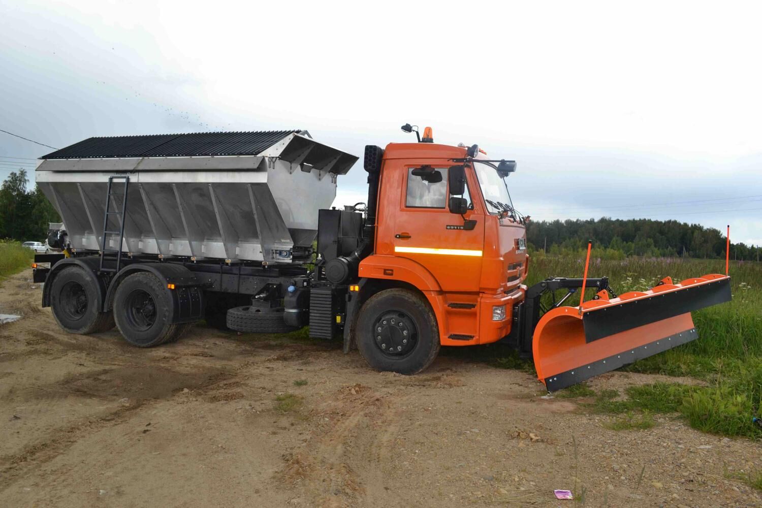 КДМ-7881022 на ш.65115-48 (ПС нерж, V=10,5 м3, Передний отвал)