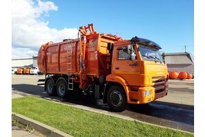 мусоровоз КО-440-5 (вместимость кузова 22м3, боковая загрузка, универсальный захват)