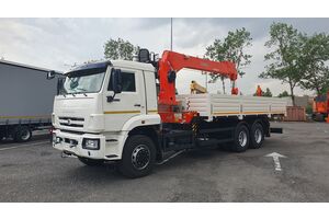 Бортовой КАМАЗ 65117-104020-49 с КМУ Kanglim 1256, задние раздвижные доп.опоры, платформа 6818